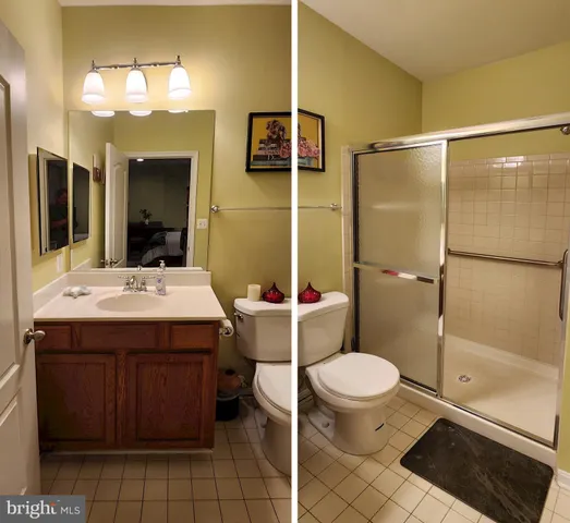 a bathroom with a bathtub and mirror