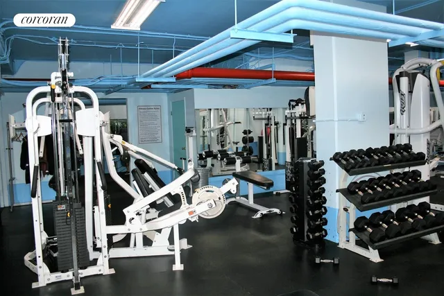 a room with lots of gym equipment