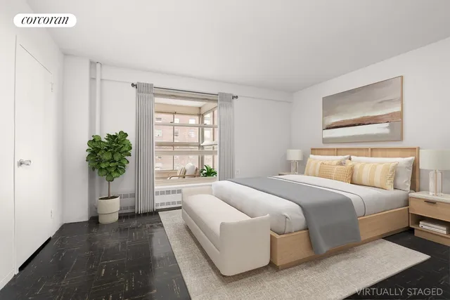 a bedroom with a large bed and a potted plant