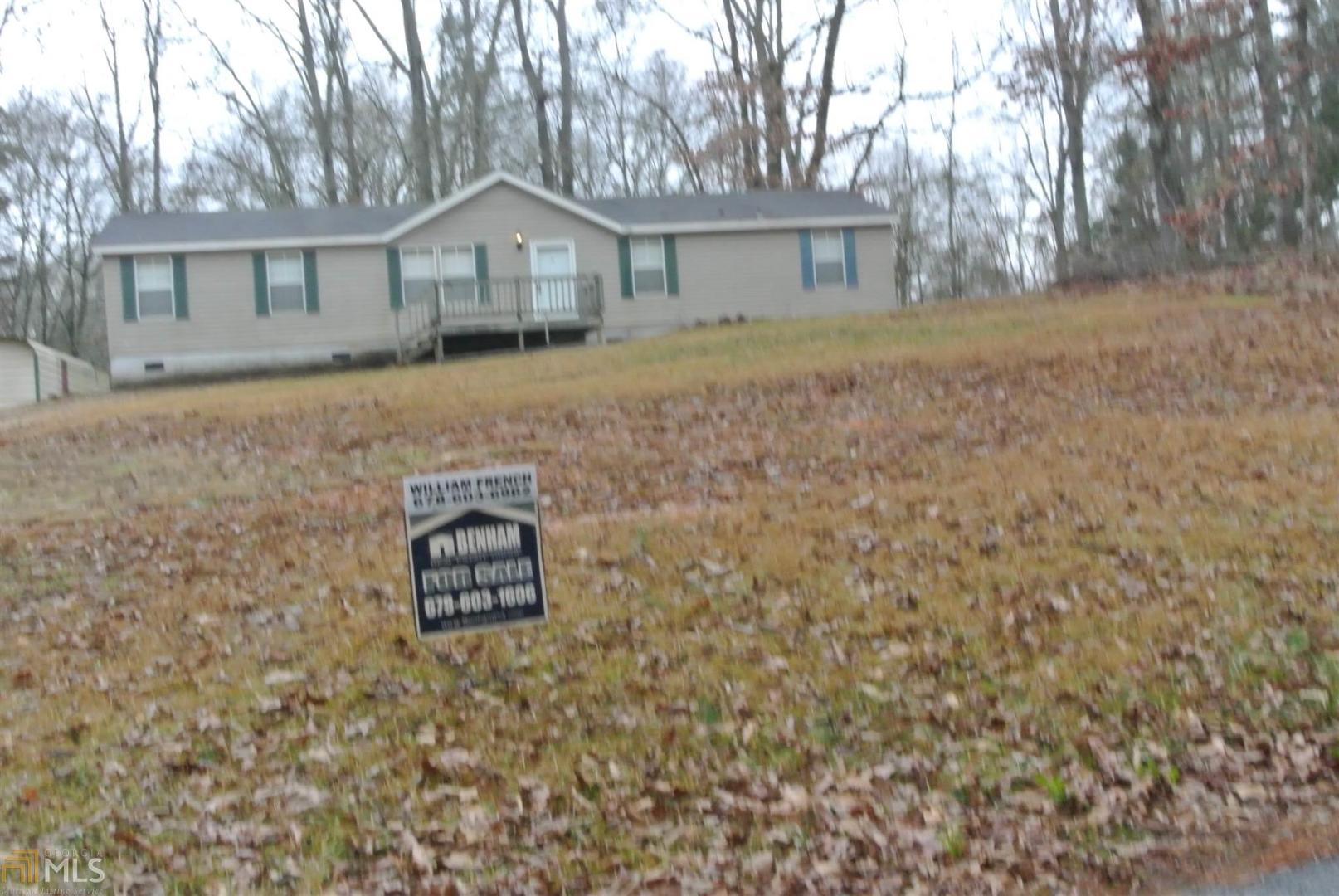 388 Old S River Road Jackson, GA 30233 - Photo 1 of 1 front view of a house with a yard