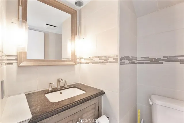 a bathroom with a sink and a toilet