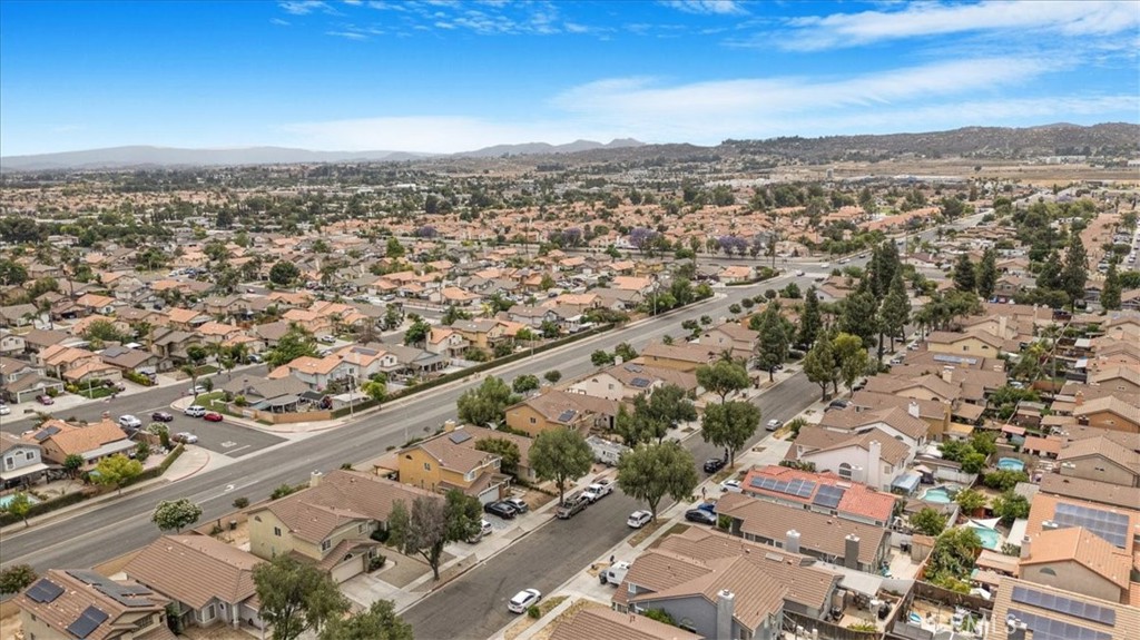 507 Coudures Way Perris, CA 92571 - Photo 4 of 41 an aerial view of city and mountain