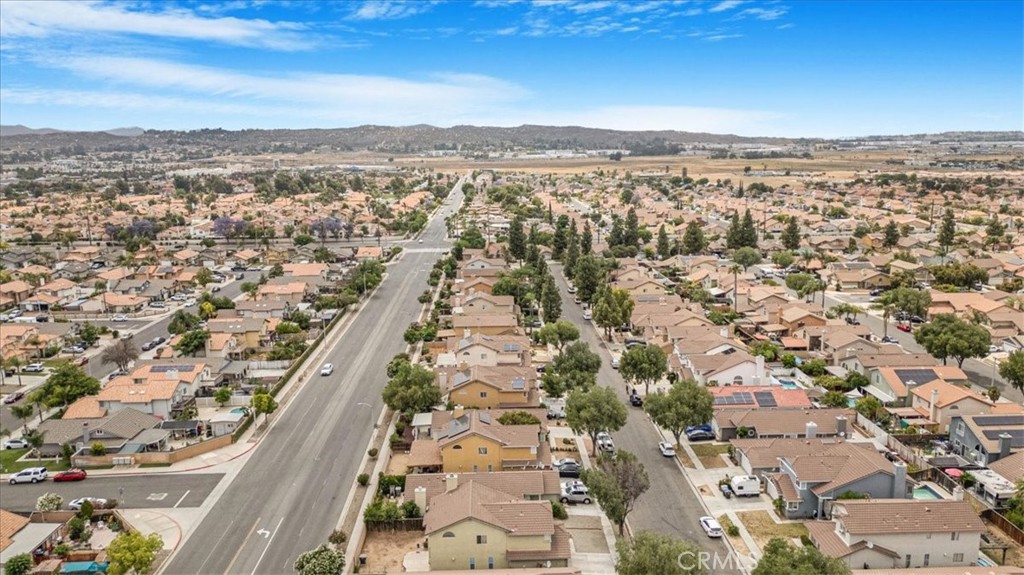 507 Coudures Way Perris, CA 92571 - Photo 5 of 41 an aerial view of residential building and city view