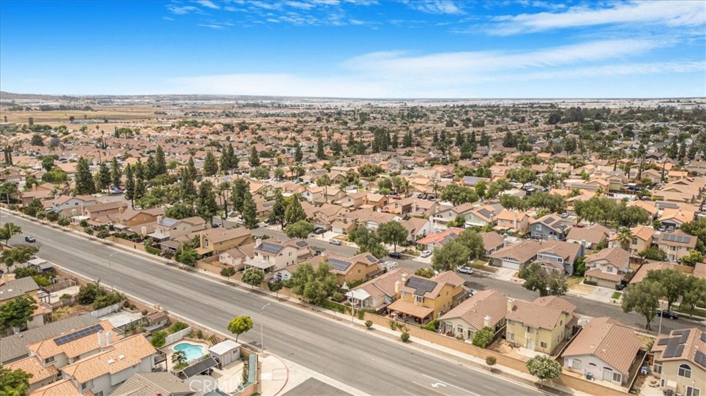 507 Coudures Way Perris, CA 92571 - Photo 6 of 41 an aerial view of residential building and ocean view