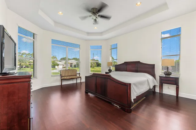 a bedroom with a balcony a bed and a couch