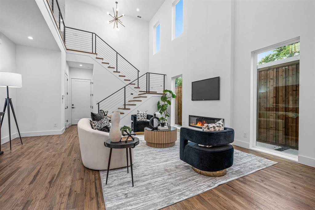 1014 Grandview Avenue Dallas, TX 75223 - Photo 11 of 30 a living room with furniture and a hard wood floor