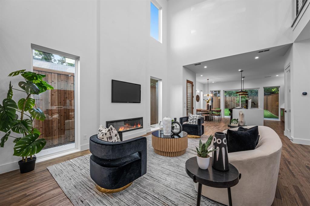1014 Grandview Avenue Dallas, TX 75223 - Photo 13 of 30 a living room with furniture and a flat screen tv