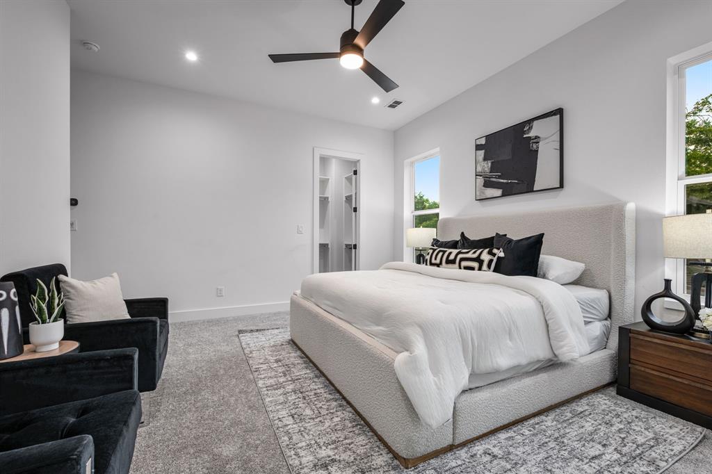 1014 Grandview Avenue Dallas, TX 75223 - Photo 18 of 30 a bedroom with bed and a window