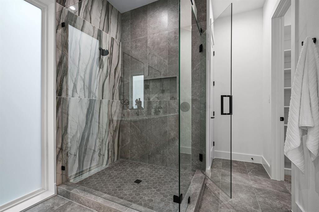 1014 Grandview Avenue Dallas, TX 75223 - Photo 20 of 30 a bathroom with a shower and a sink