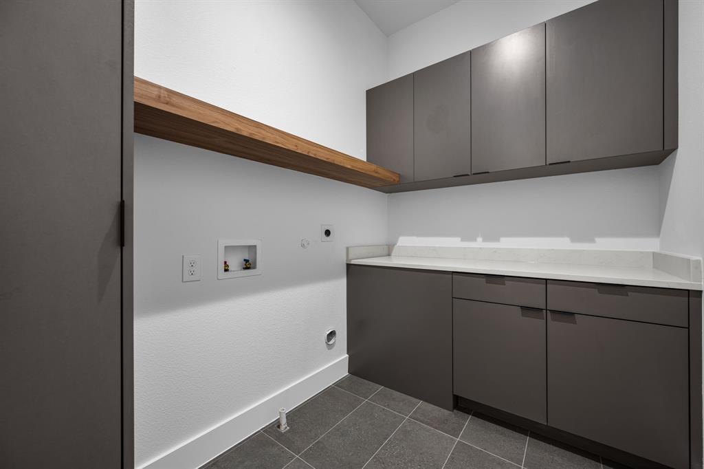 1014 Grandview Avenue Dallas, TX 75223 - Photo 22 of 30 a kitchen with a sink and cabinets