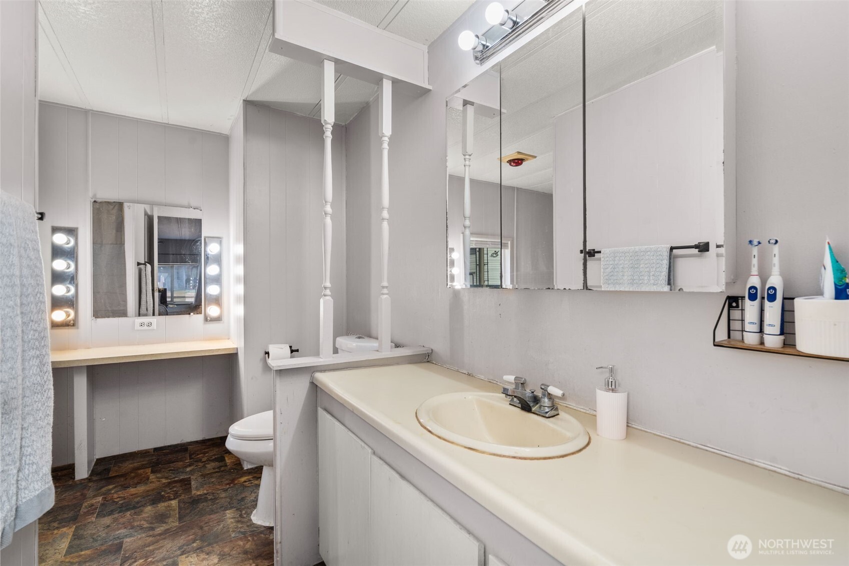19121 Elderberry Street Southwest Rochester, WA 98579 - Photo 18 of 34 a bathroom with a sink and a mirror