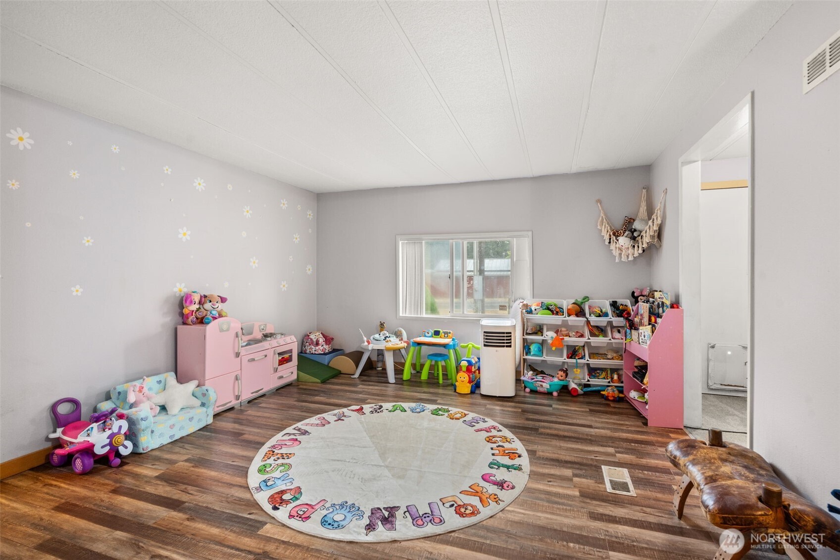 19121 Elderberry Street Southwest Rochester, WA 98579 - Photo 20 of 34 a room with toys and wooden floor