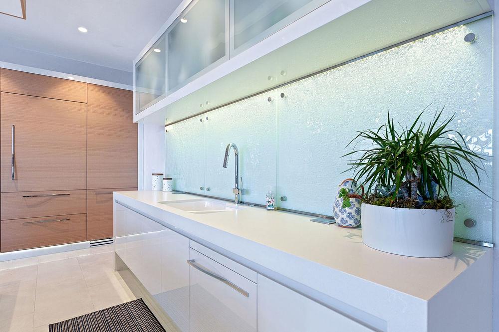 201 Cannery Row, Unit 6 Monterey, CA 93940 - Photo 15 of 30 a bathroom with a sink a mirror and a potted plant