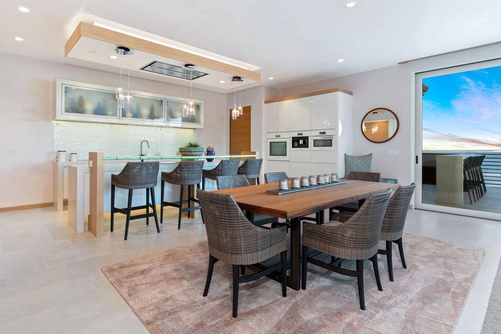 201 Cannery Row, Unit 6 Monterey, CA 93940 - Photo 8 of 30 a view of a dining area with furniture and a rug