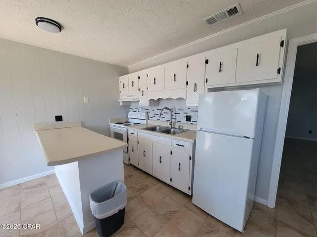 $1,000 | 6529 Chipewa Street, Unit F, Panama City, FL 32404