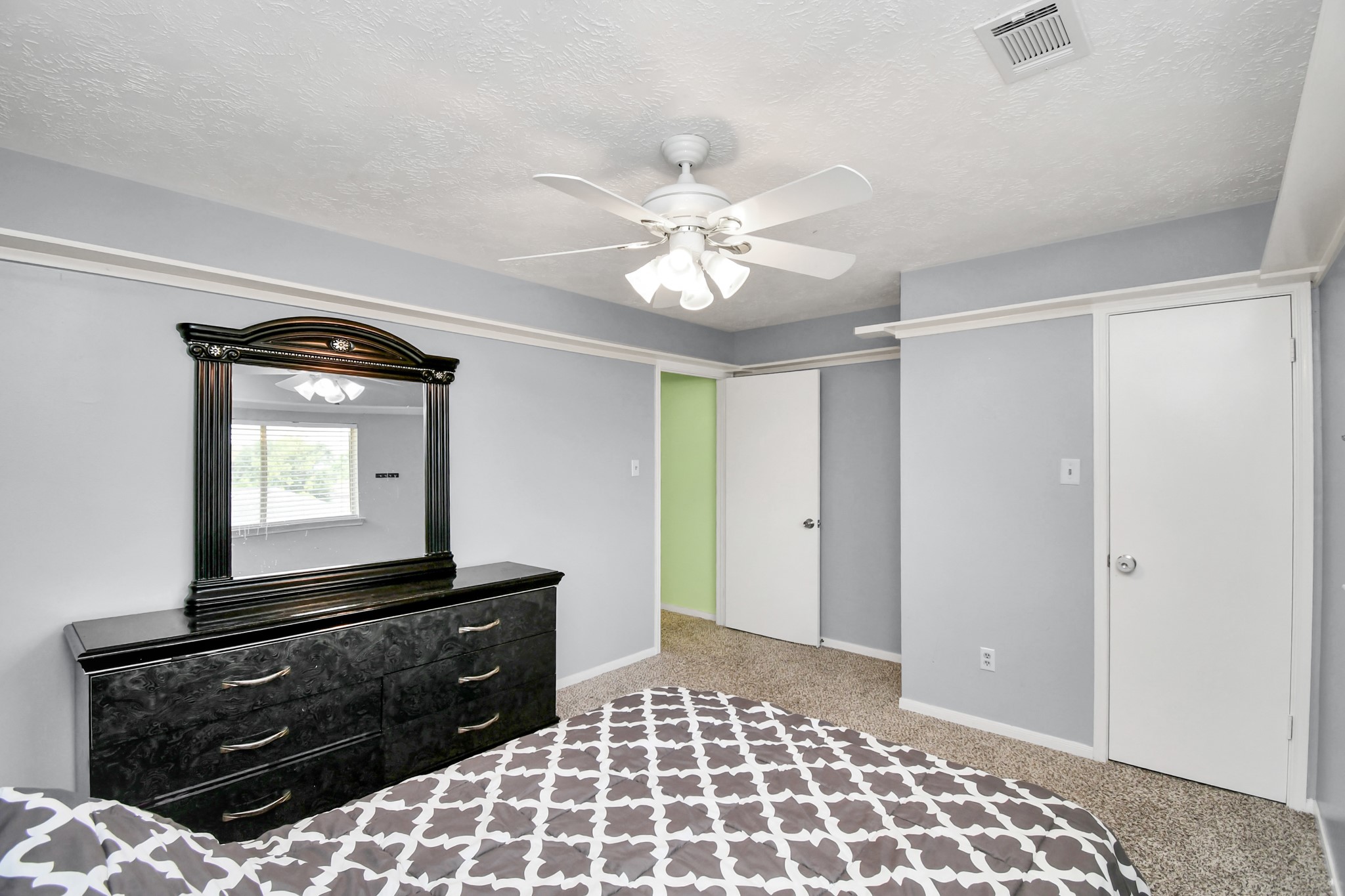 3402 Haydee Road Spring, TX 77388 - Photo 17 of 26 a bathroom with a sink vanity and a mirror