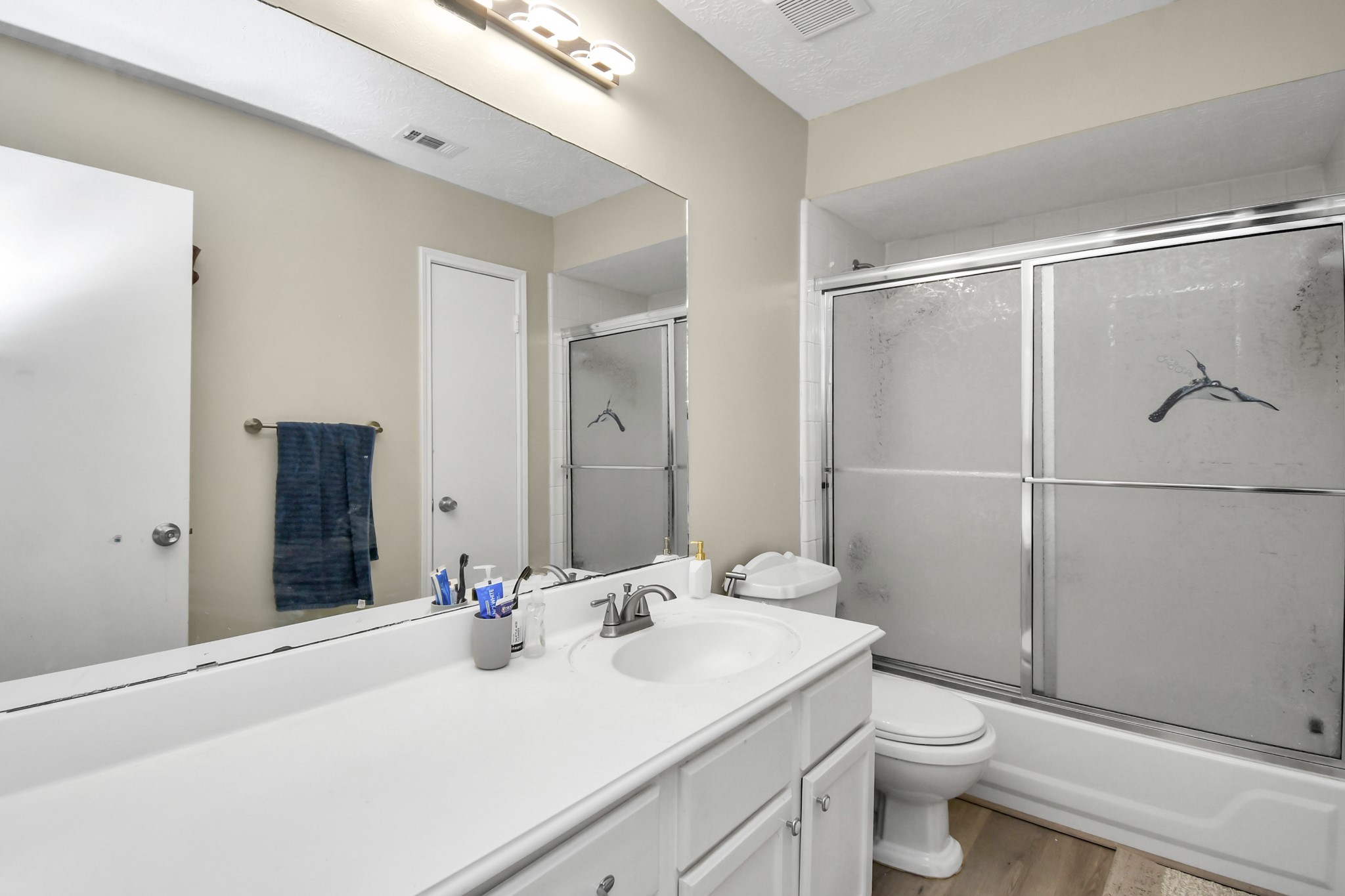 3402 Haydee Road Spring, TX 77388 - Photo 18 of 26 a bathroom with a sink toilet and shower