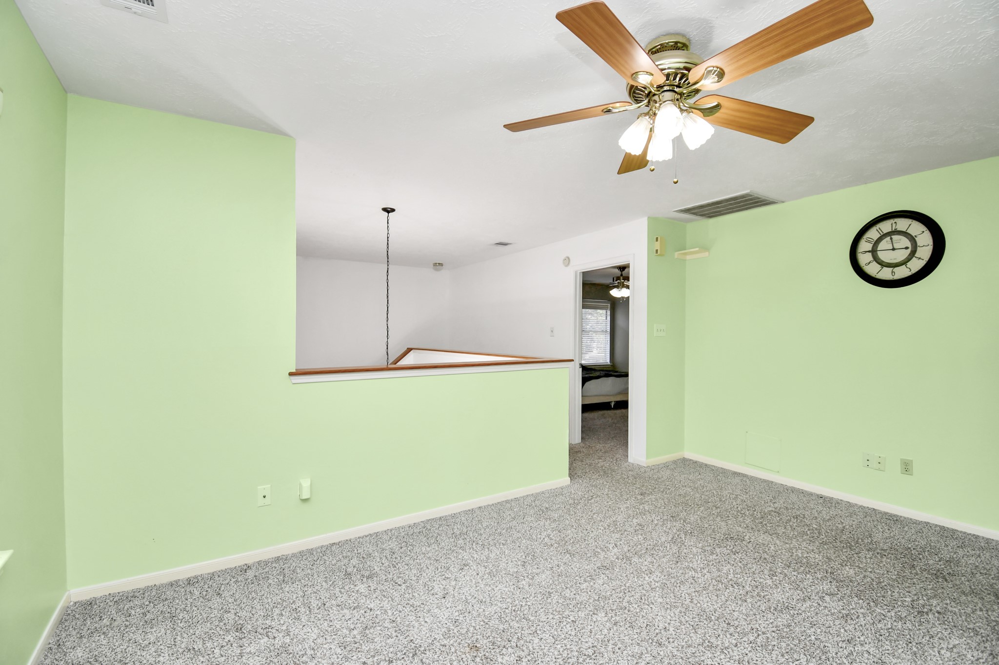 3402 Haydee Road Spring, TX 77388 - Photo 21 of 26 a view of a room with a fan and a window