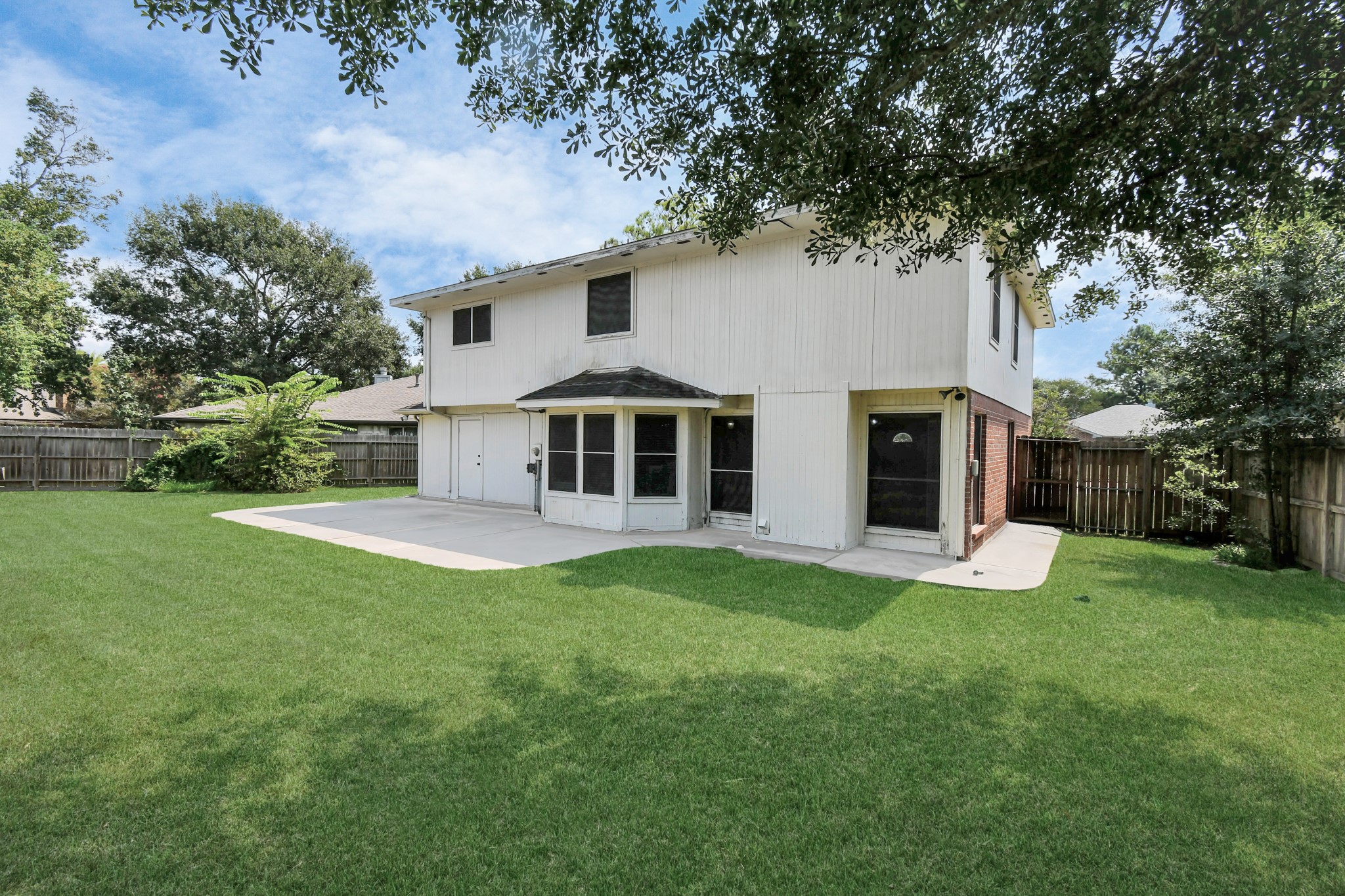 3402 Haydee Road Spring, TX 77388 - Photo 23 of 26 a view of a house with a yard porch and sitting area