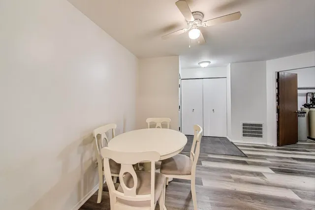 a view of a dining room with furniture