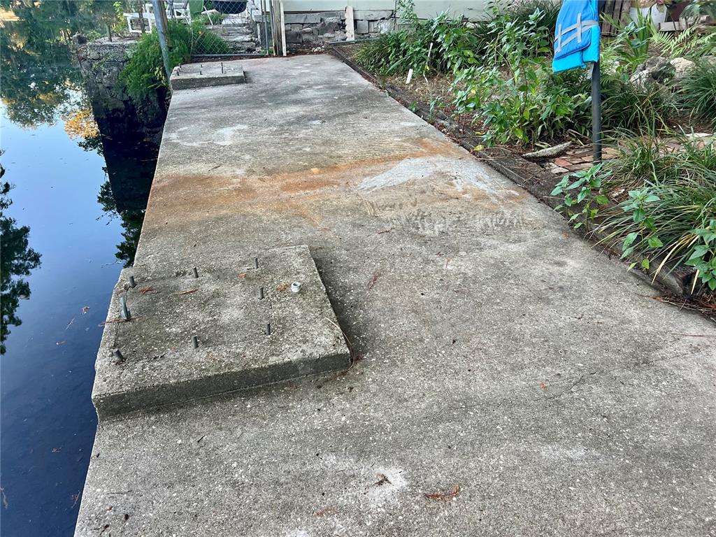 7165 Algonquin Street Weeki Wachee, FL 34607 - Photo 4 of 7 a view of a backyard