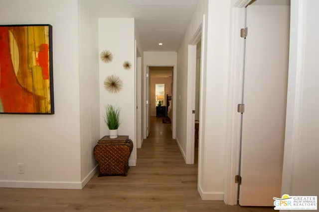 a view of a porch with chairs and table in patio