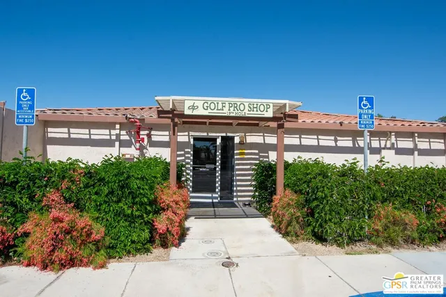 a view of an empty space and tennis court