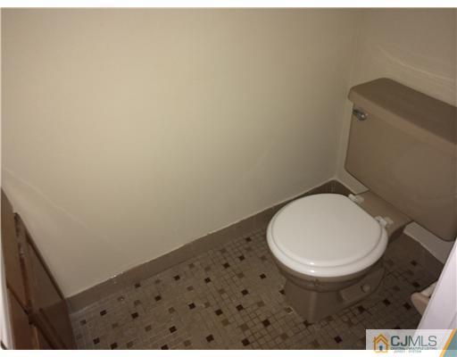 281 Rector Street Perth Amboy, NJ 08861 - Photo 9 of 10 a bathroom with a toilet