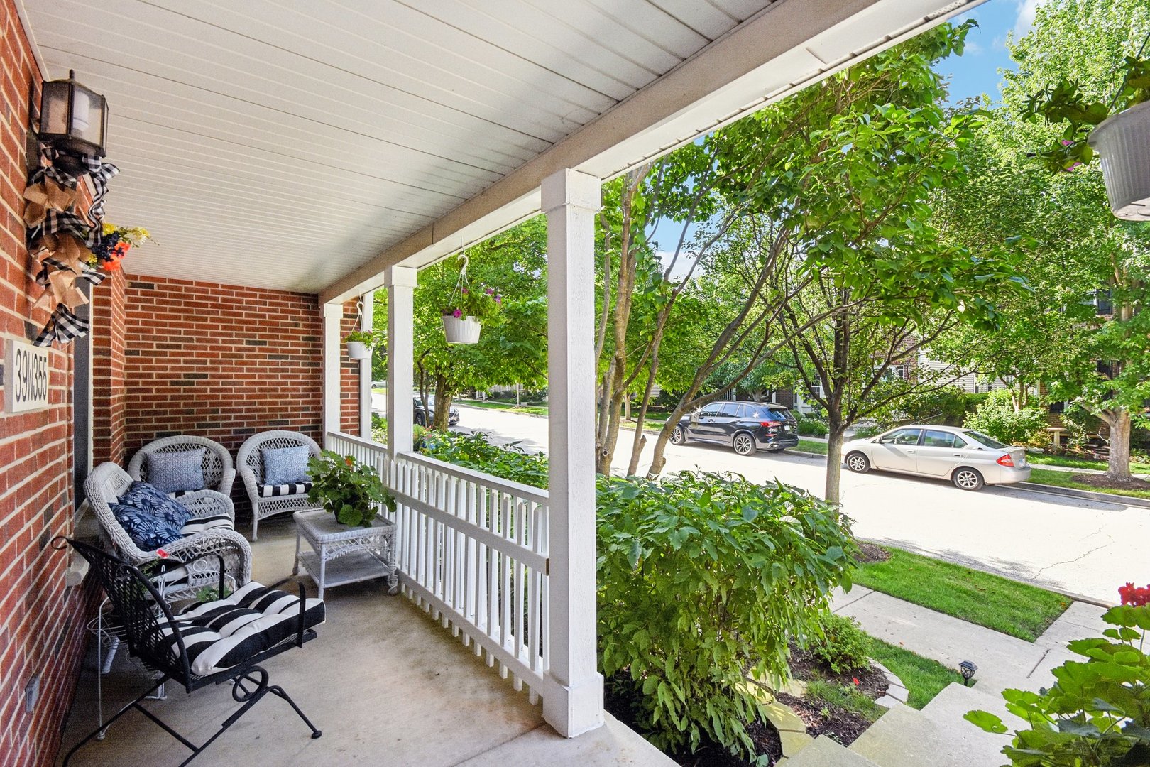 39W355 Baker Drive Geneva, IL 60134 - Photo 2 of 22 a view of a porch with furniture and garden