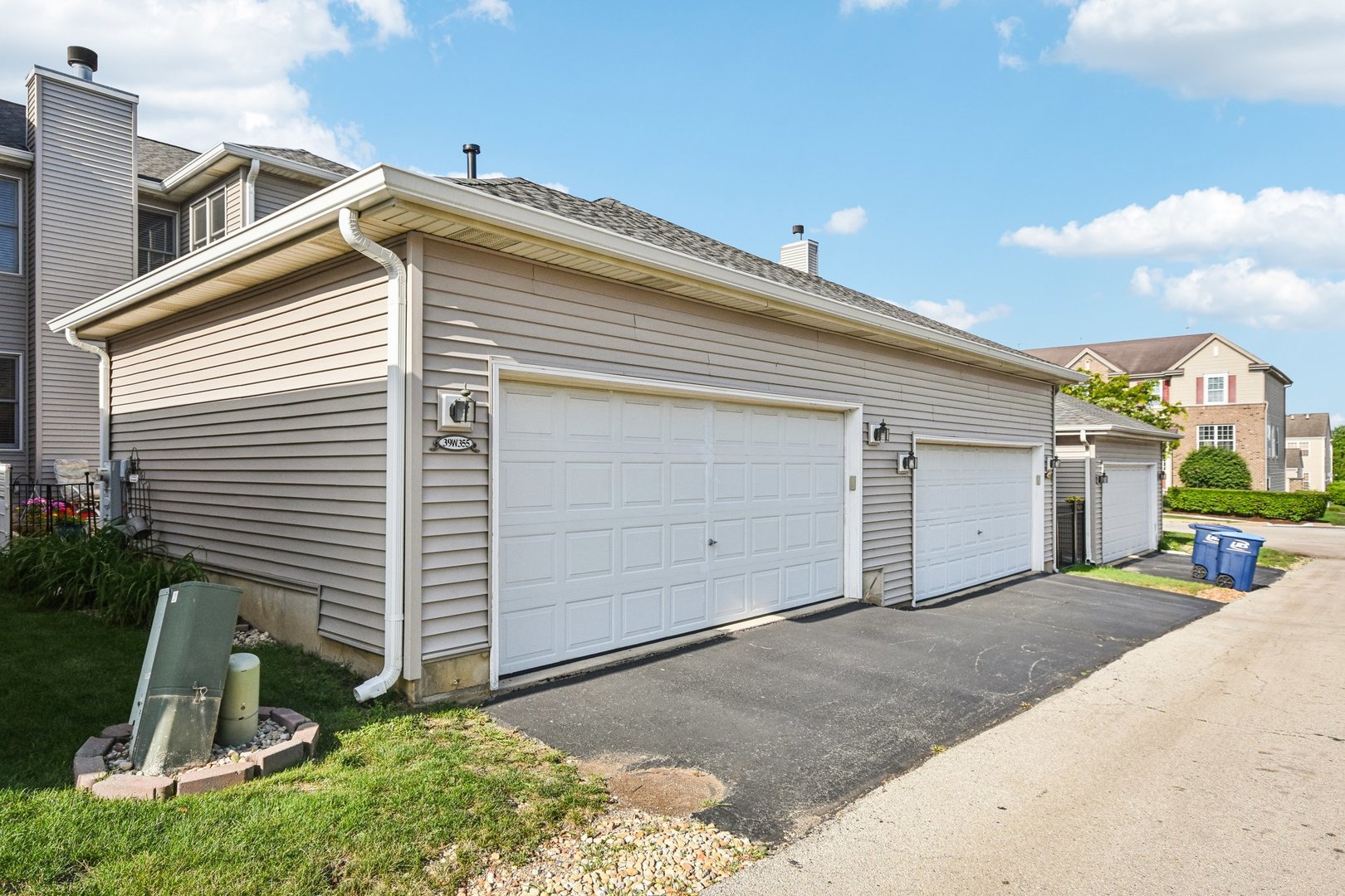 39W355 Baker Drive Geneva, IL 60134 - Photo 22 of 22 a view of a house with a yard and garage