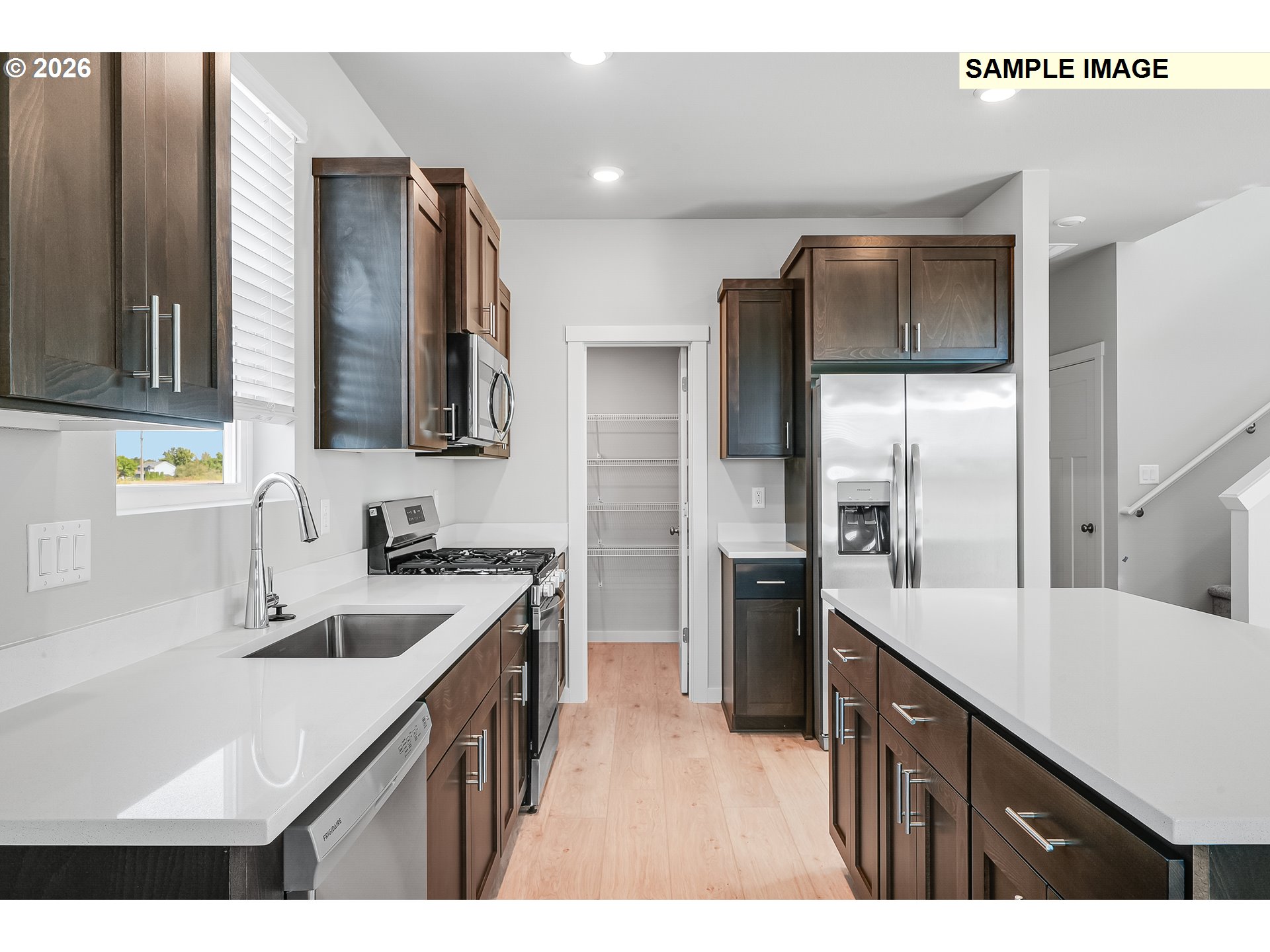 31775 Northwest Timeric Drive North Plains, OR 97133 - Photo 12 of 21 a kitchen with a sink appliances and cabinets