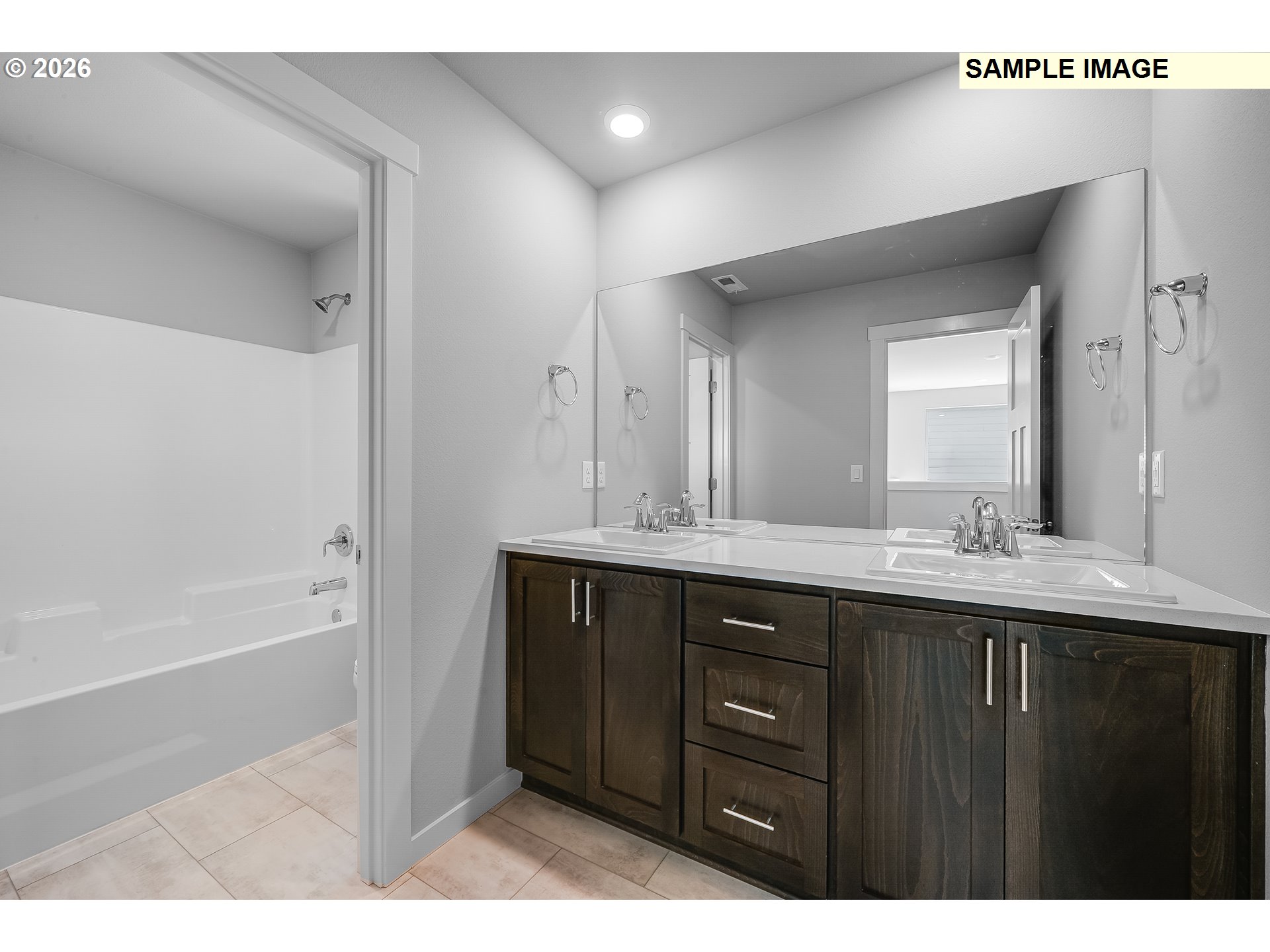 31775 Northwest Timeric Drive North Plains, OR 97133 - Photo 16 of 21 a bathroom with a tub sink vanity granite and mirror