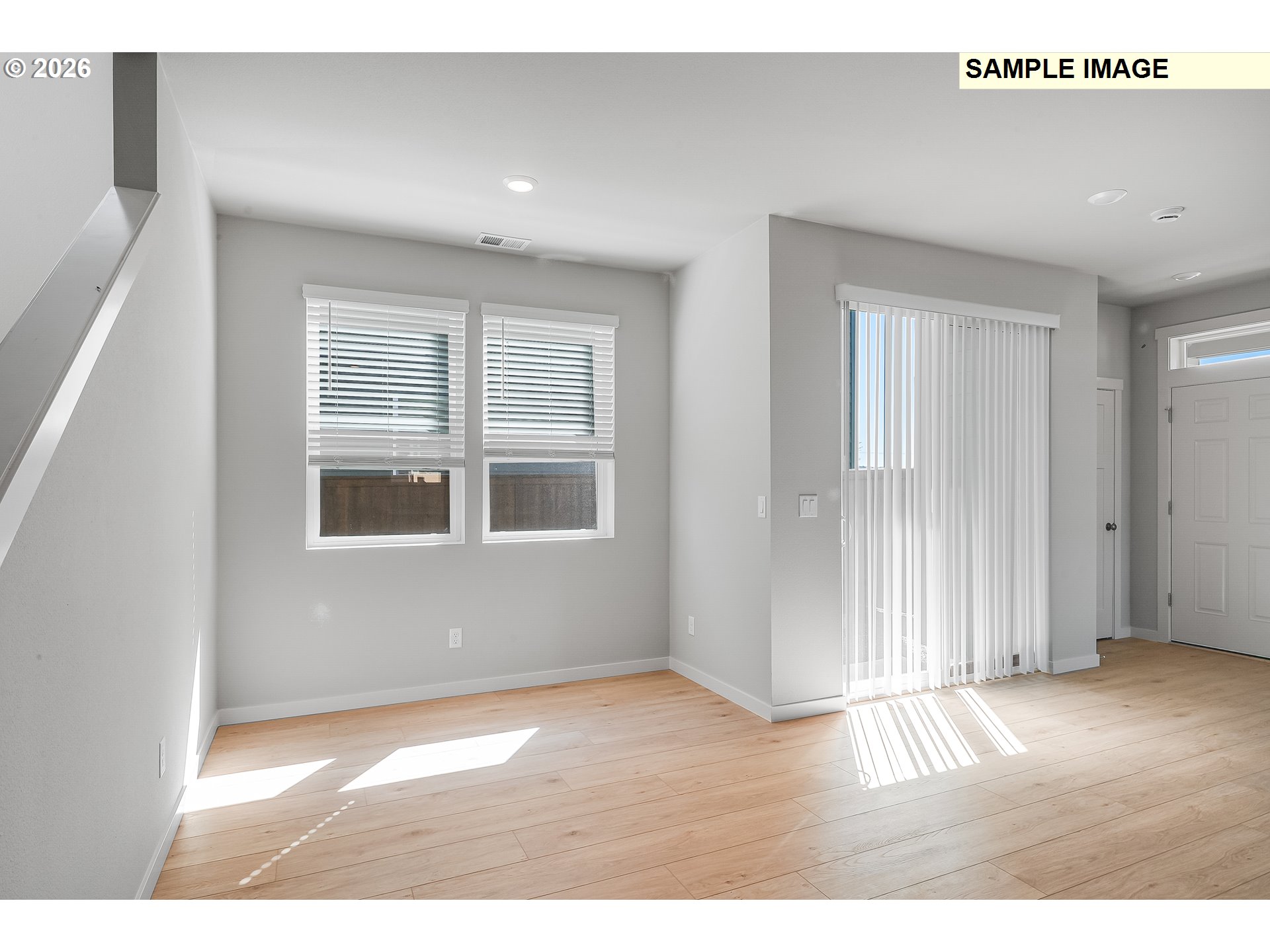 31775 Northwest Timeric Drive North Plains, OR 97133 - Photo 4 of 21 an empty room with wooden floor and windows