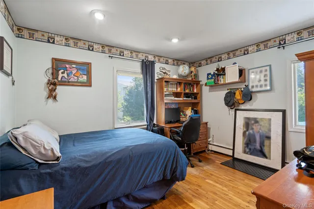 a bedroom with furniture and a bed