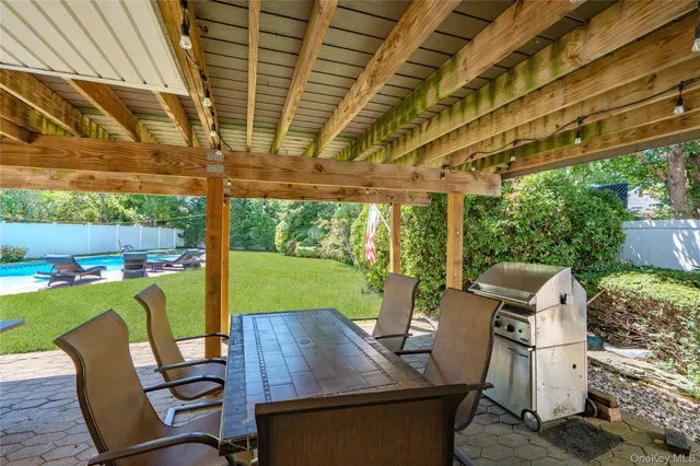 a view of yard with seating space