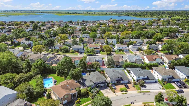 an aerial view of a city with lots of residential buildings