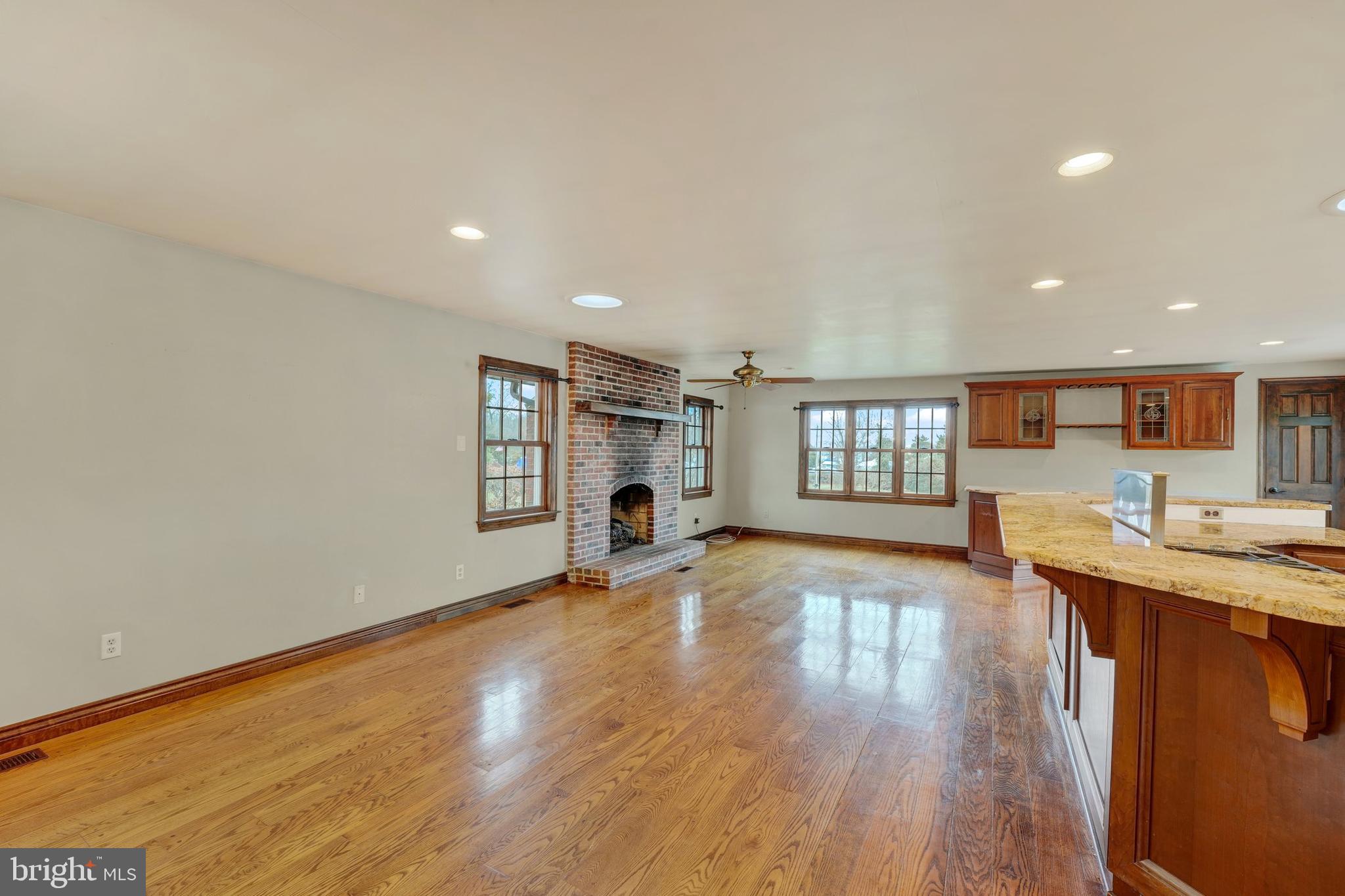 174 2 Rivers Road Chesapeake City, MD 21915 - Photo 23 of 44 Fireplace which is perfect for two overstuffed