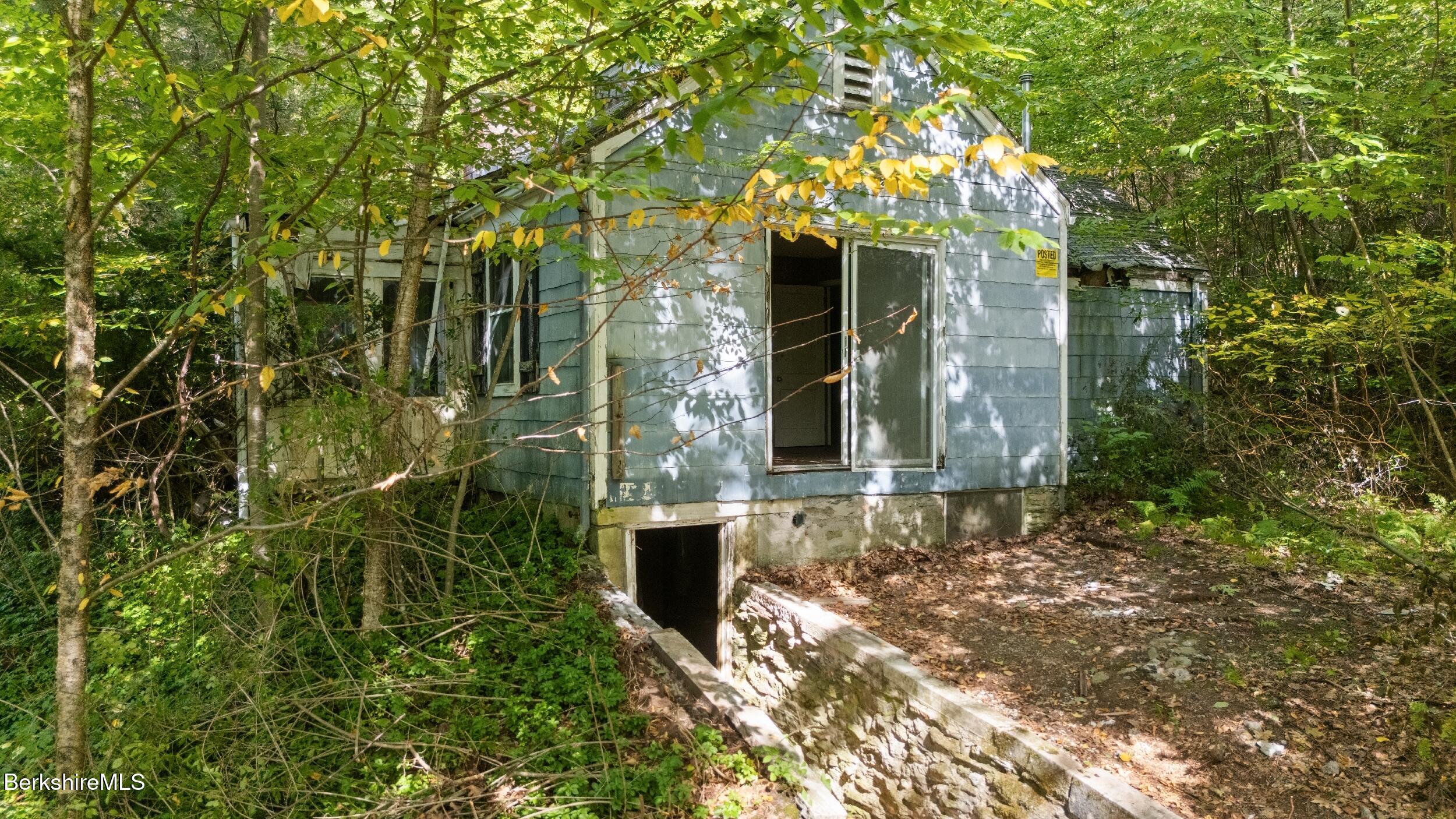 416 W Road Alford, MA 01266 - Photo 12 of 21 a yellow building with trees in front of it