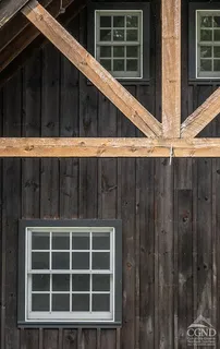a view of wooden house with a window