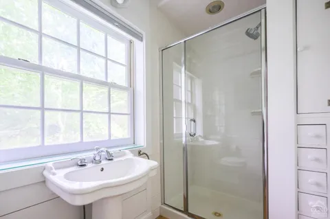 a bathroom with a sink and a bathtub