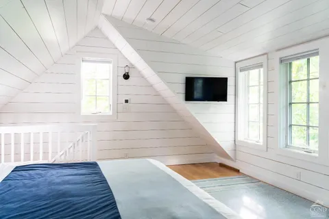a view of entryway with wooden floor