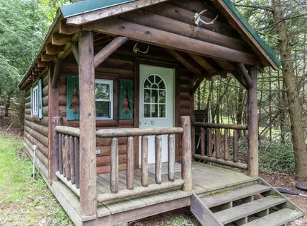 a view of a chair and table in the balcony