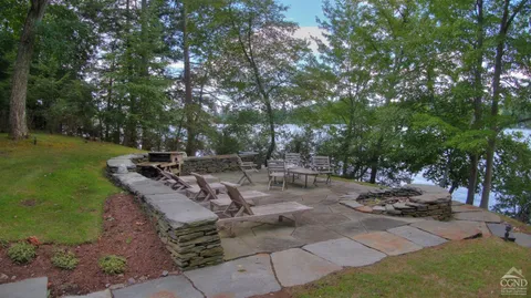 a view of a park with large trees