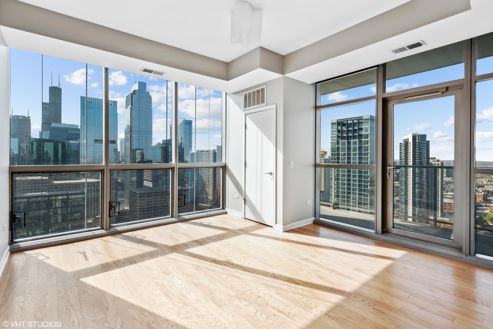 Undisclosed Address Chicago, IL 60654 - Photo 2 of 22 a view of a room with a large windows