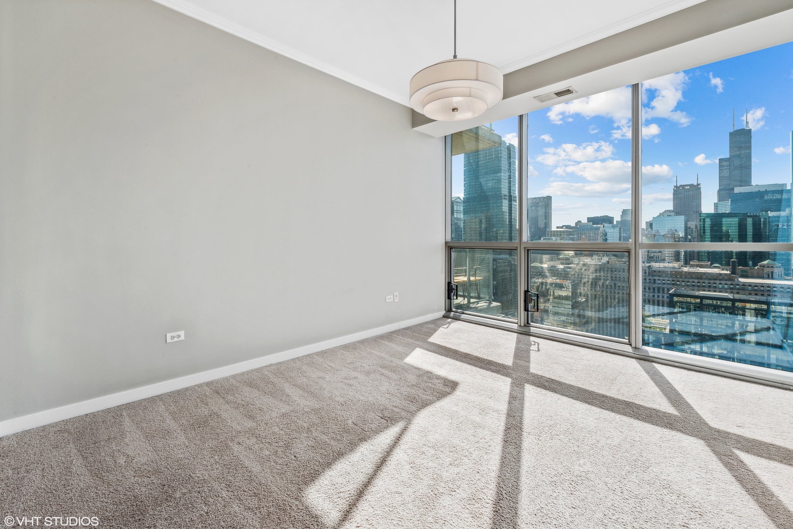 Undisclosed Address Chicago, IL 60654 - Photo 8 of 22 a view of a room with a large window