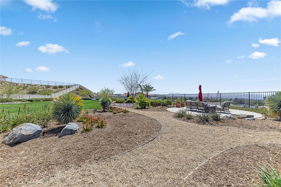 7631 Capstone Court Riverside, CA 92506 - Photo 30 of 39 Flat, usable backyard offering exceptional space and possibilities.