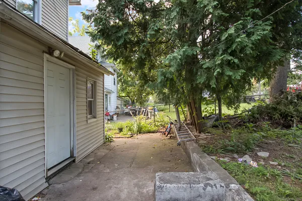 a view of a back yard of the house
