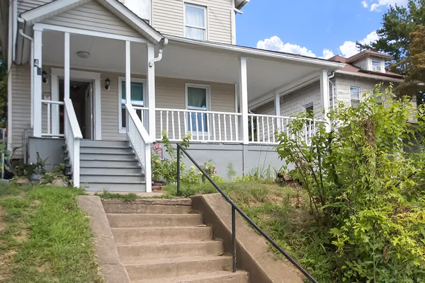 a view of a house with entryway and stairs