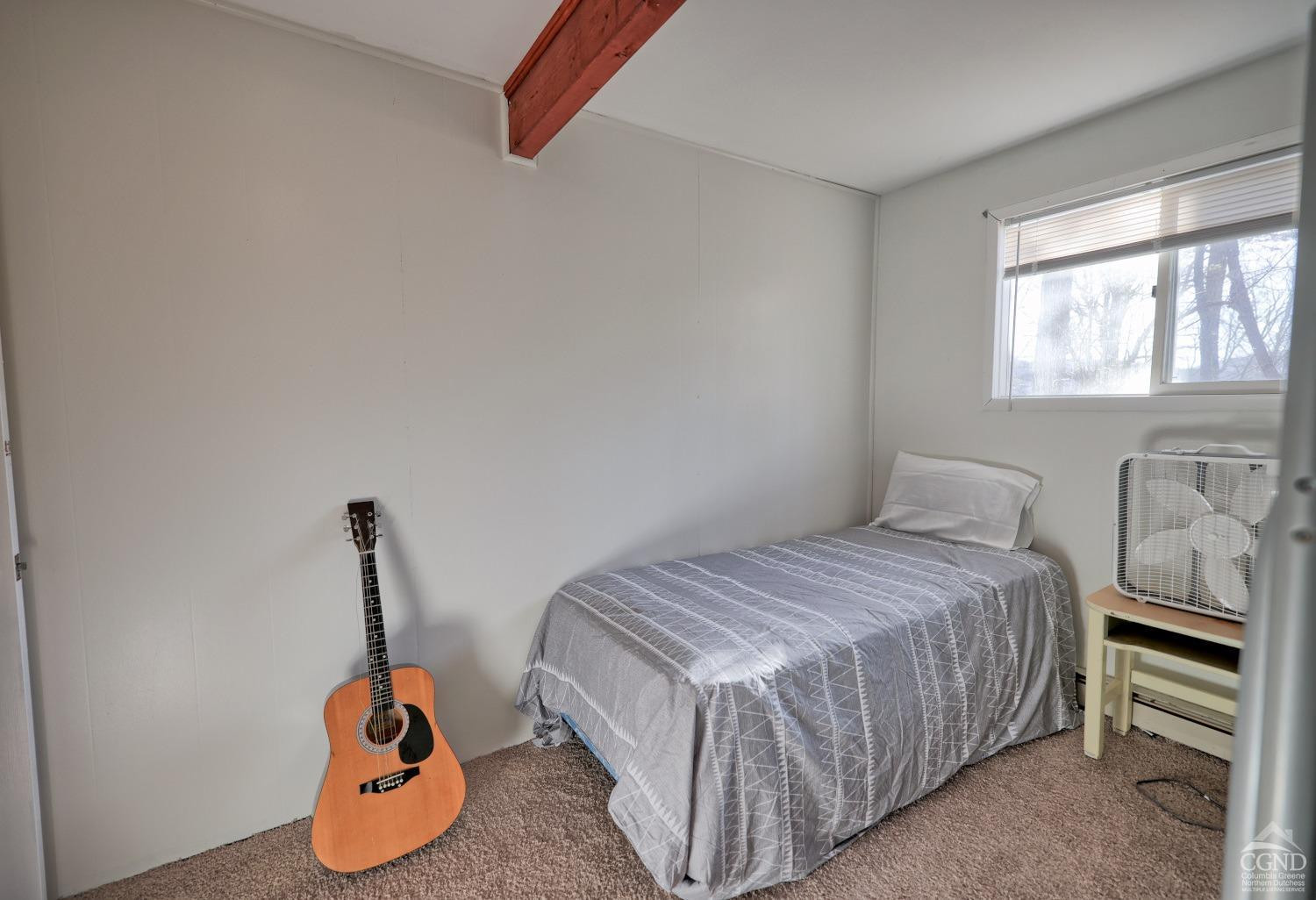 31 Showers Road Hunter, NY 12485 - Photo 39 of 89 a bedroom with a bed and a window