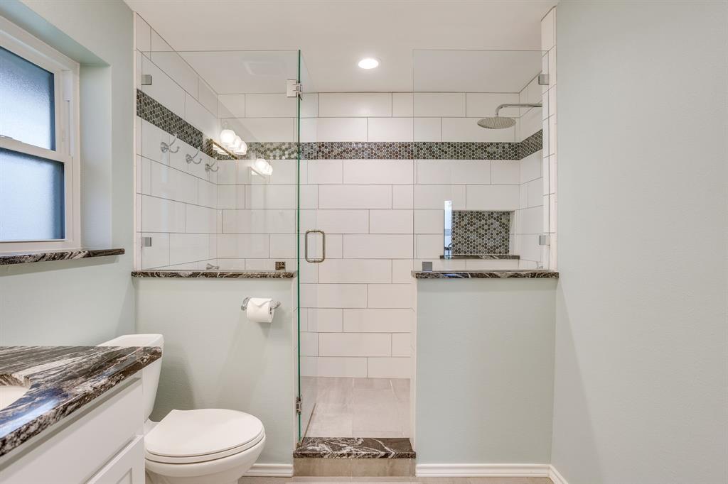 10814 Power Squadron Road Azle, TX 76020 - Photo 16 of 34 a bathroom with a shower a toilet and a shower